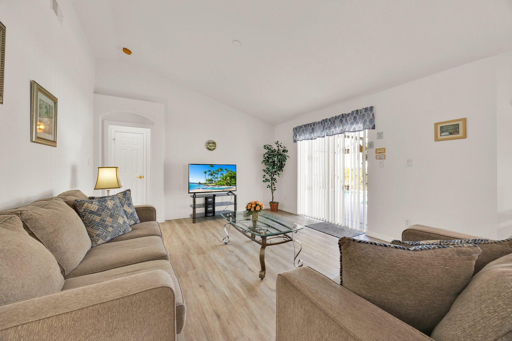 Family room with entertainment center and TV