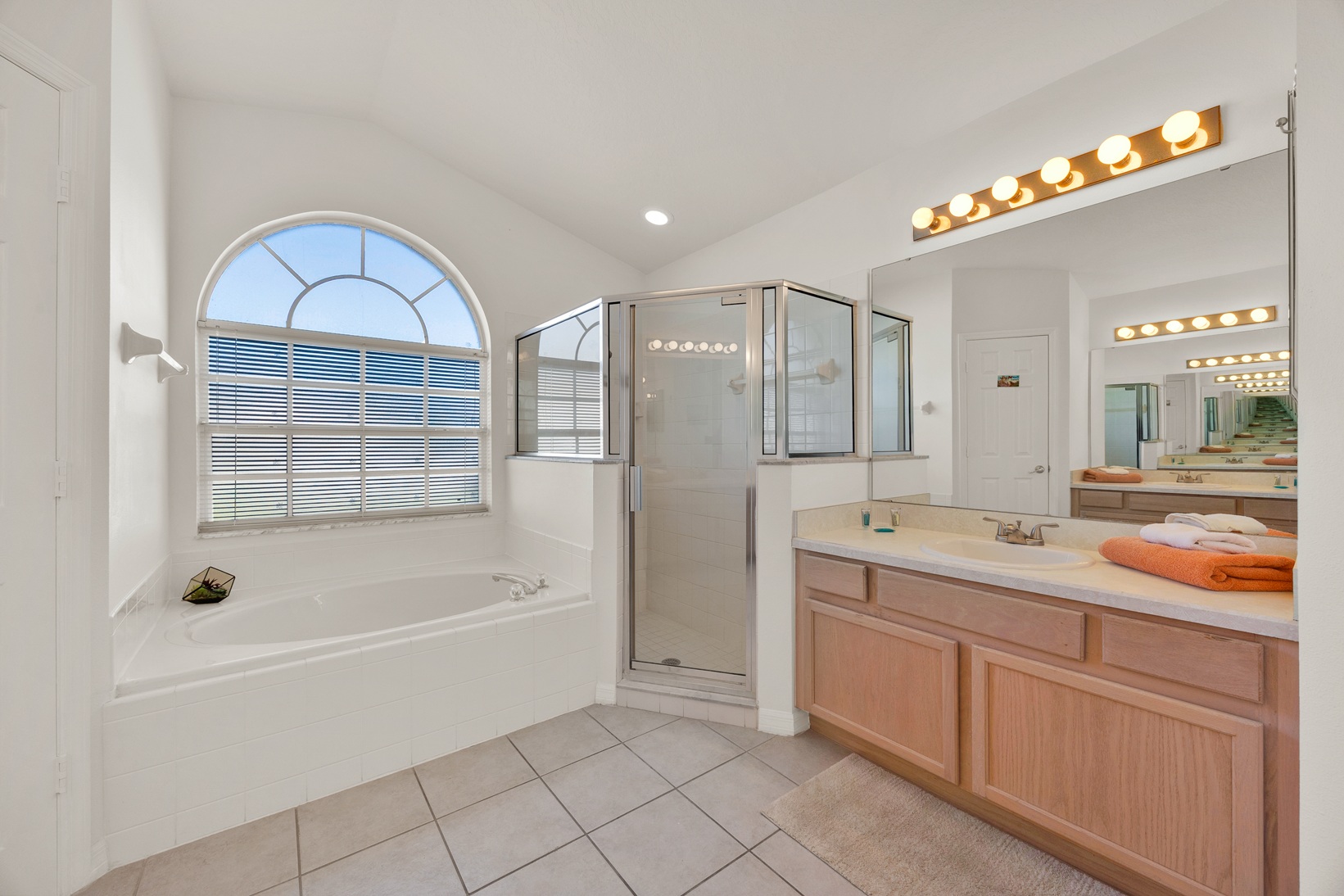 En suite master bathroom with vanity sink