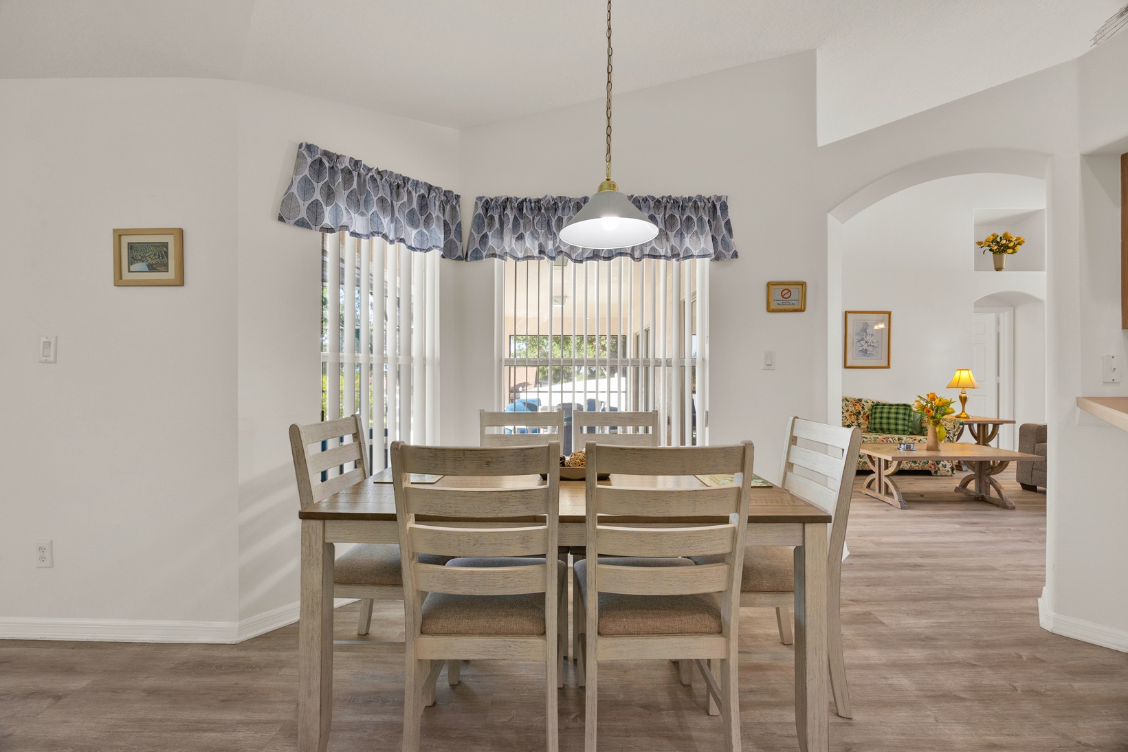 Bright breakfast table area overlooking the pool view