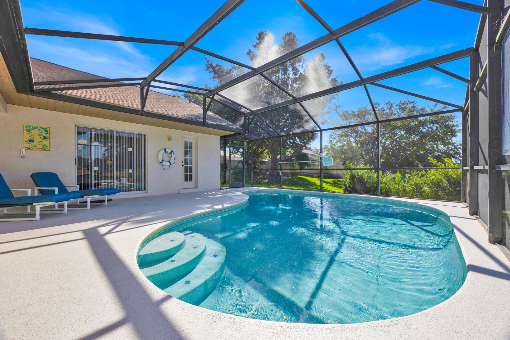 Private screened-in swimming pool at Greater Groves Florida villa