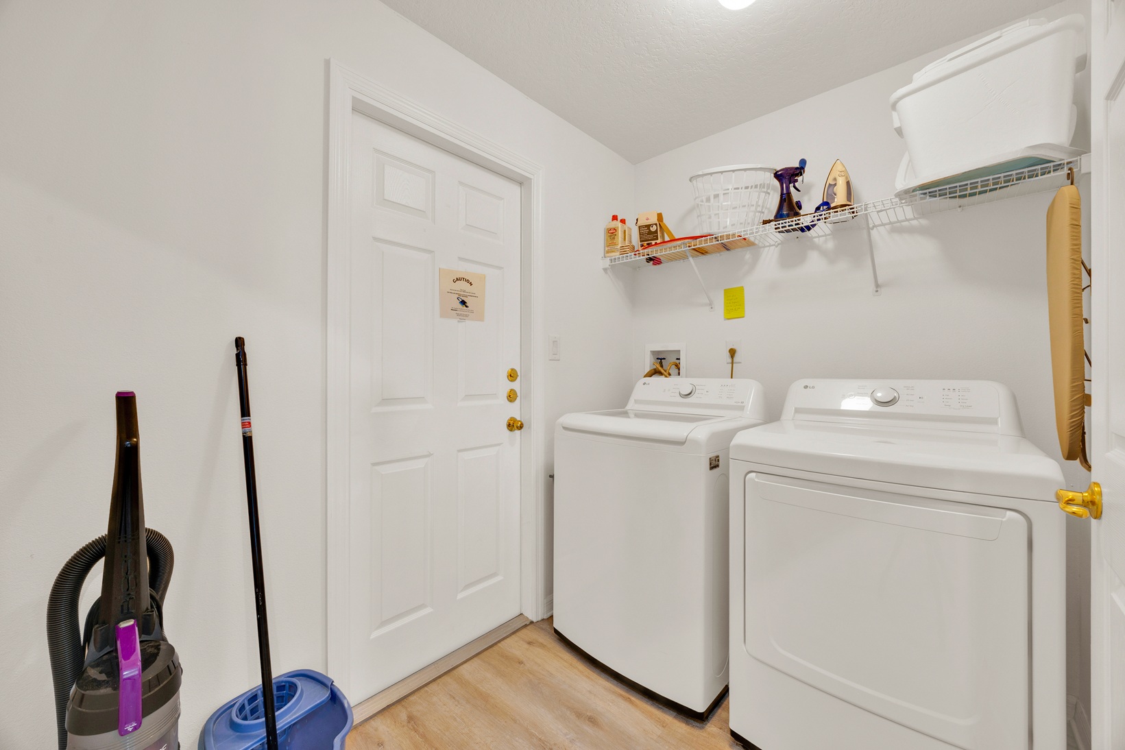 Utility room with washer and dryer facilities